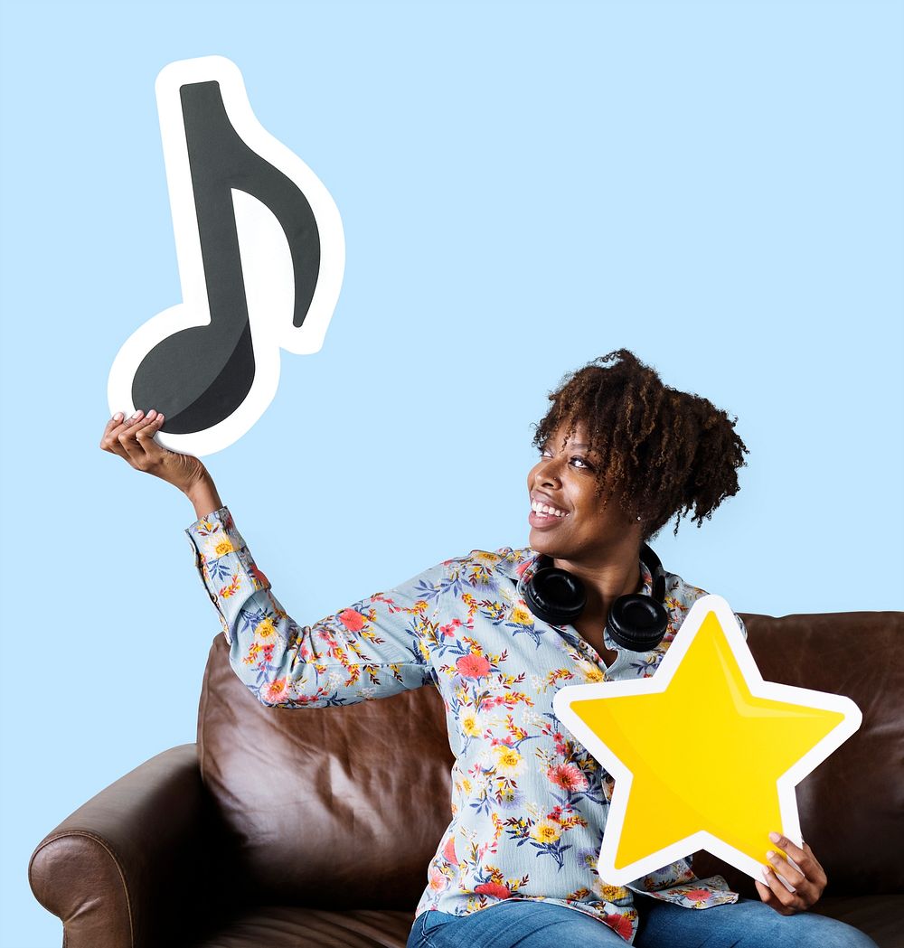 African American woman holding a musical note