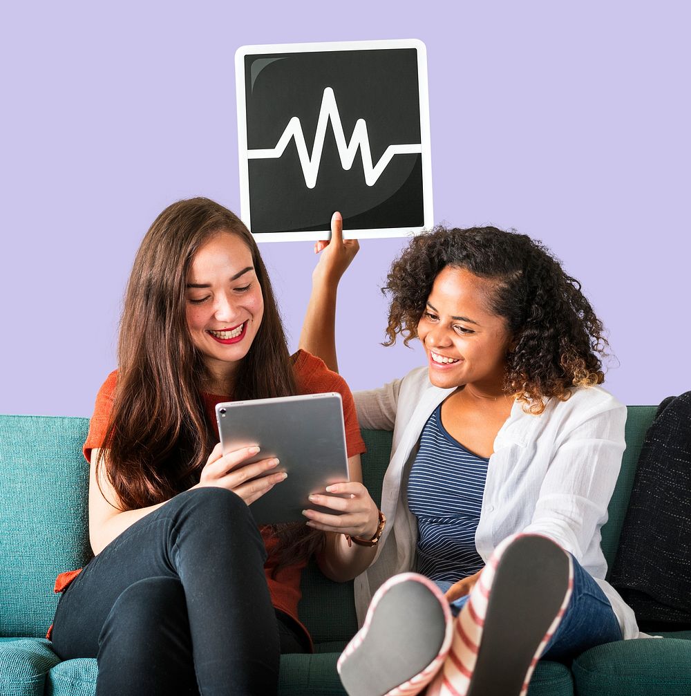 Young female friends holding a frequency icon