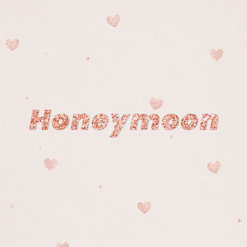 Glittery honeymoon typography on heart patterned background