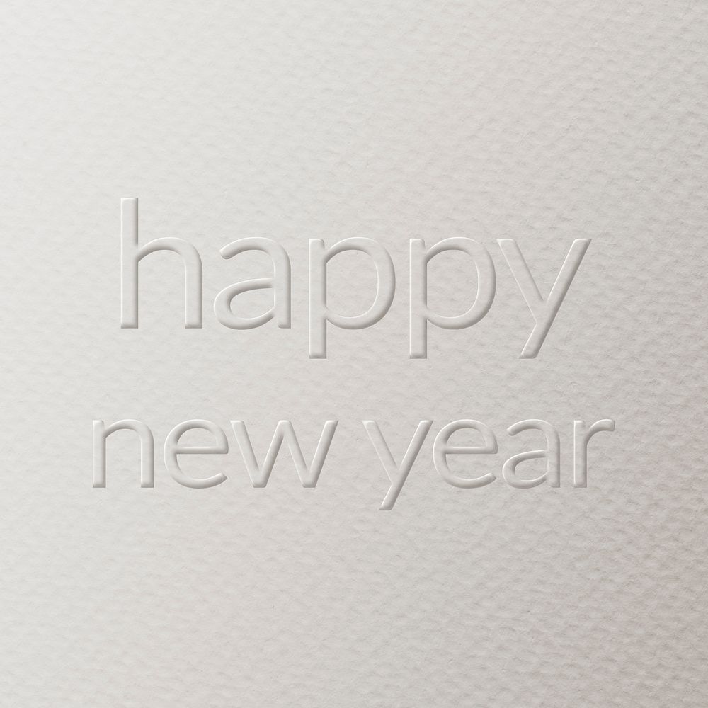 Happy new year embossed text white paper background