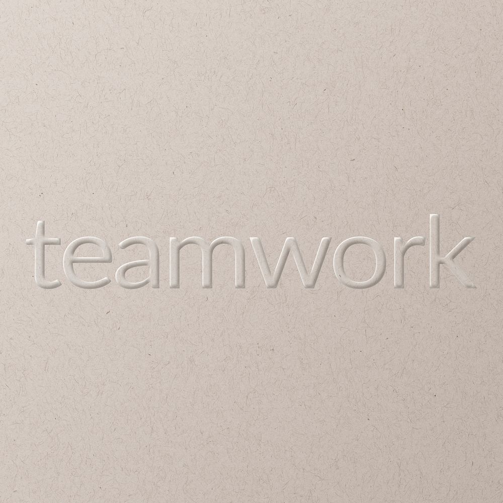 Teamwork embossed font white paper background