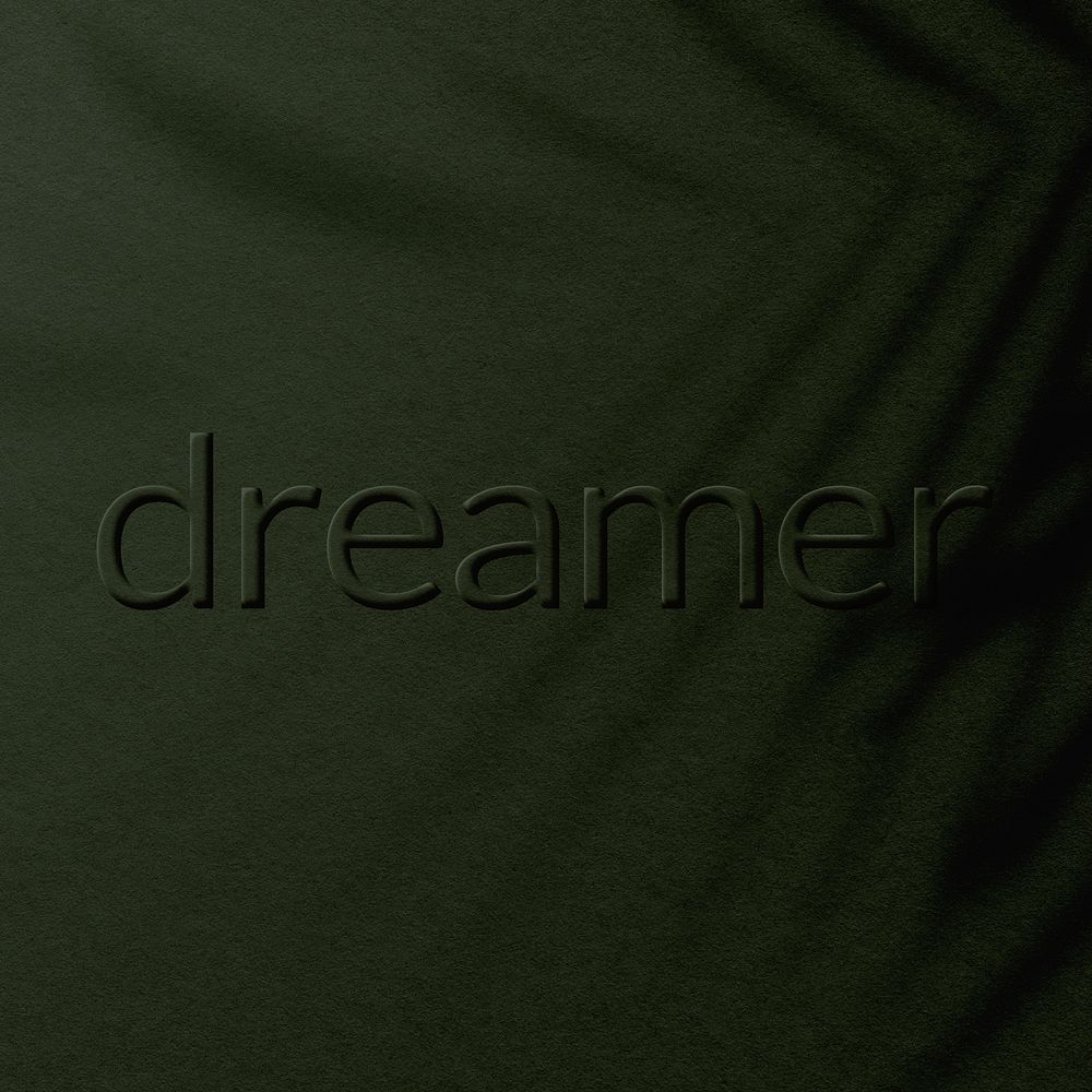 Embossed dreamer letter plant shadow textured backdrop typography