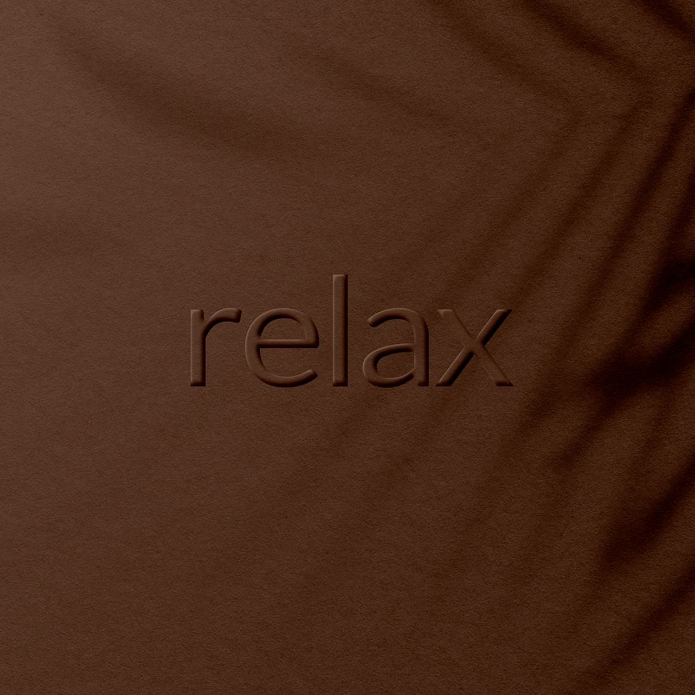 Relax word embossed plant shadow textured font