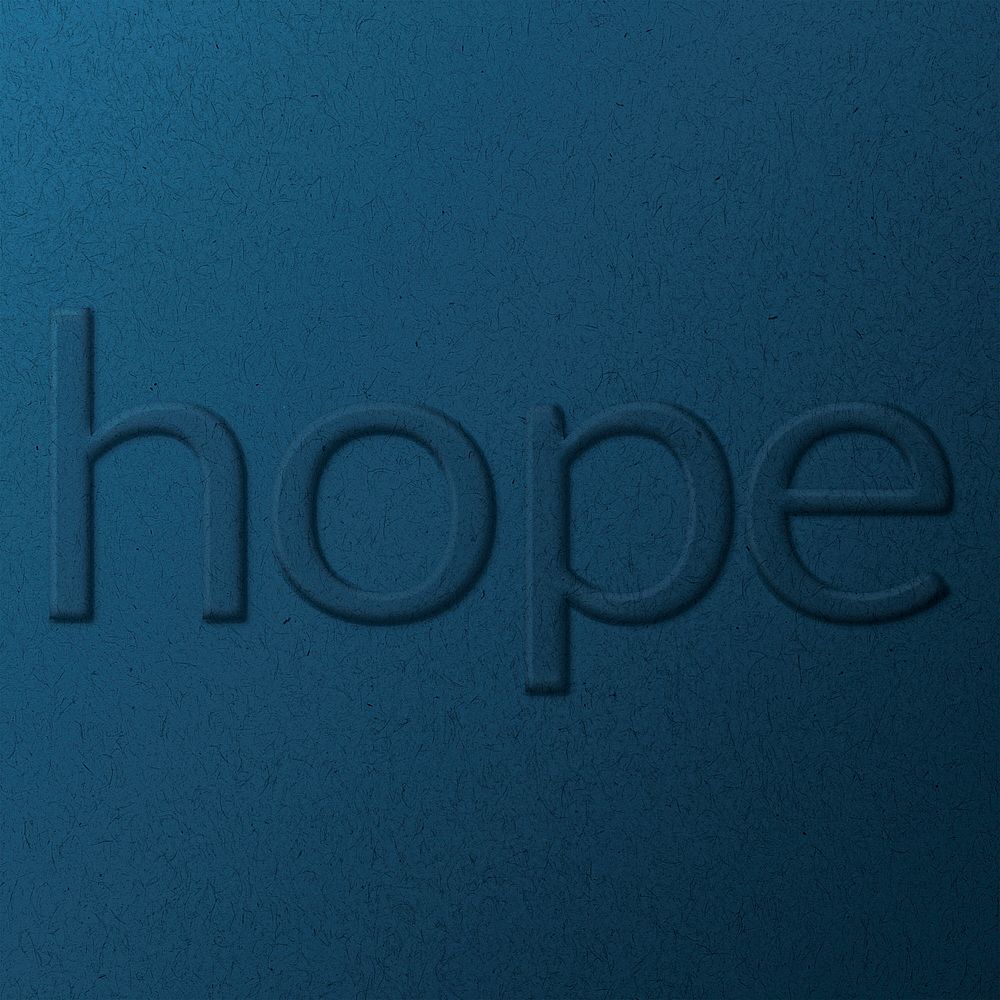 Word hope embossed typography on paper texture