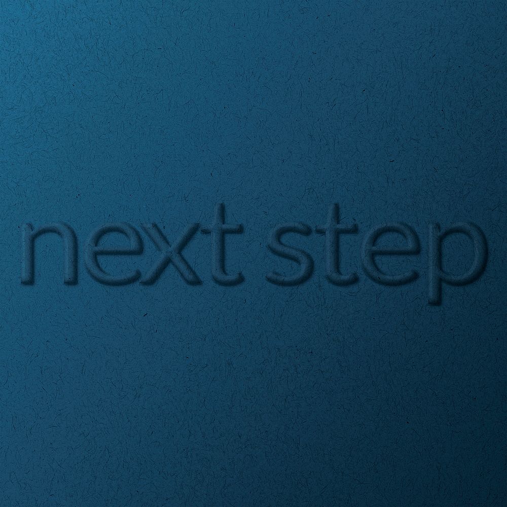 Next step phrase emboss typography on paper texture