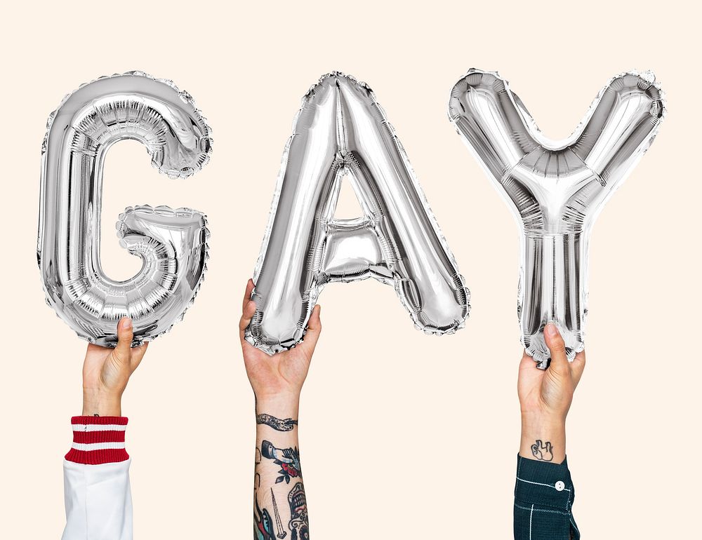 Silver gray alphabet balloons forming the word gay