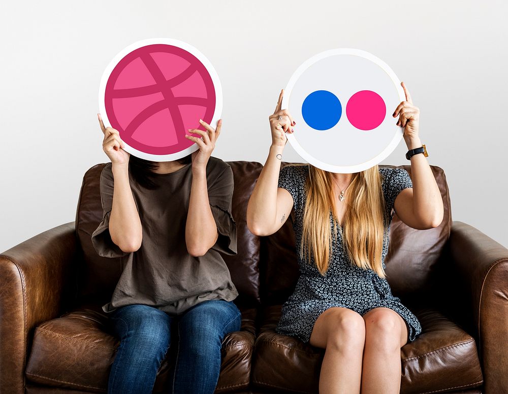 People holding social media icons