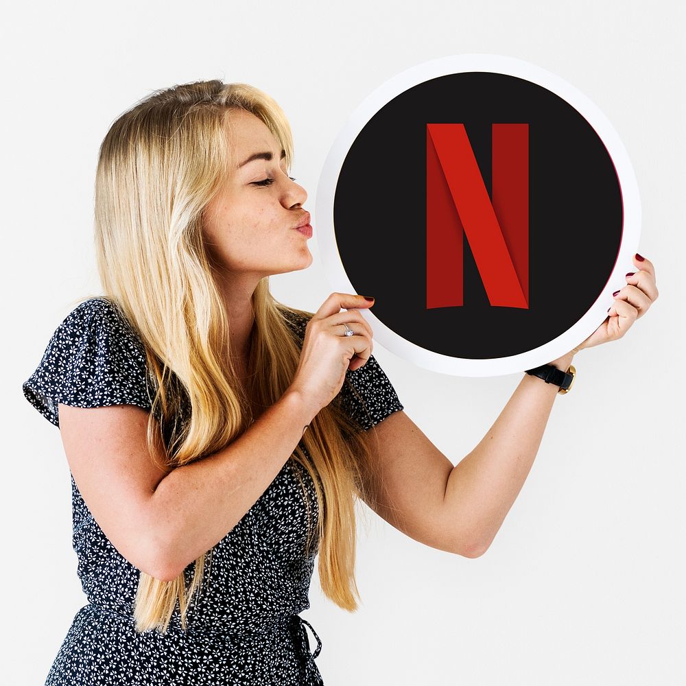 Woman blowing a kiss to a Netflix icon