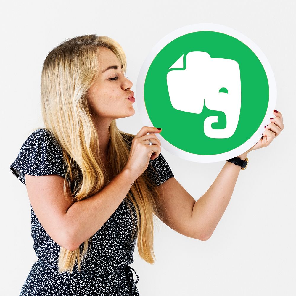Woman holding an Evernote icon