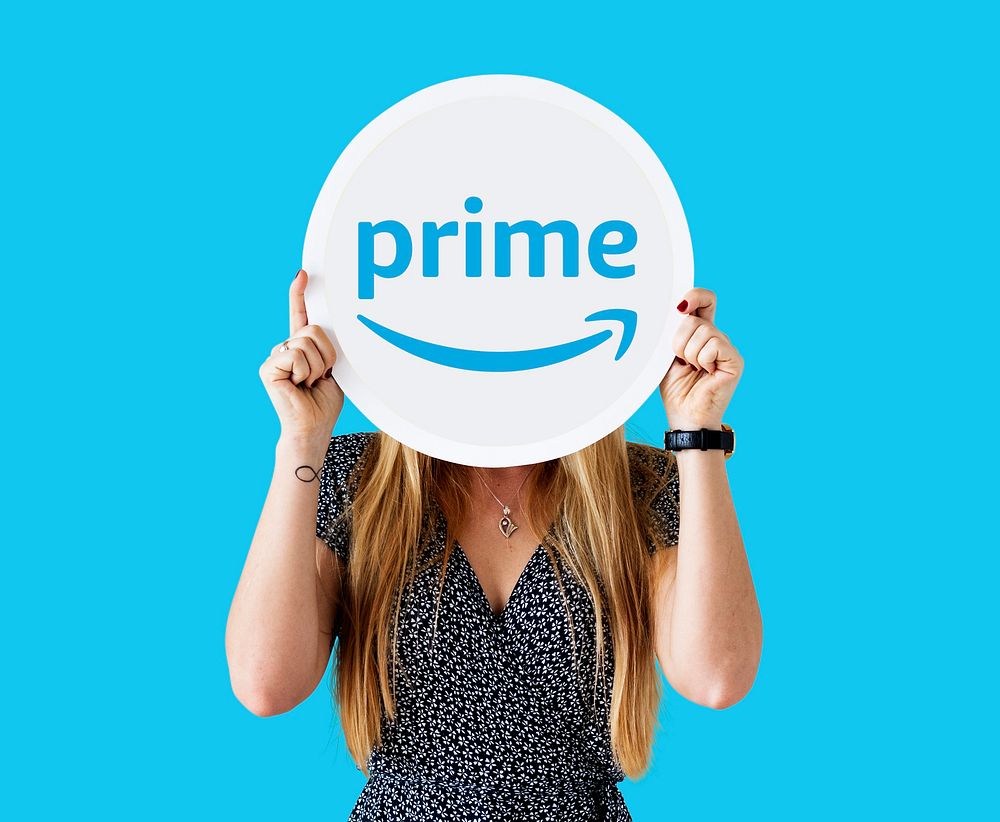 Woman showing a Prime Video sign