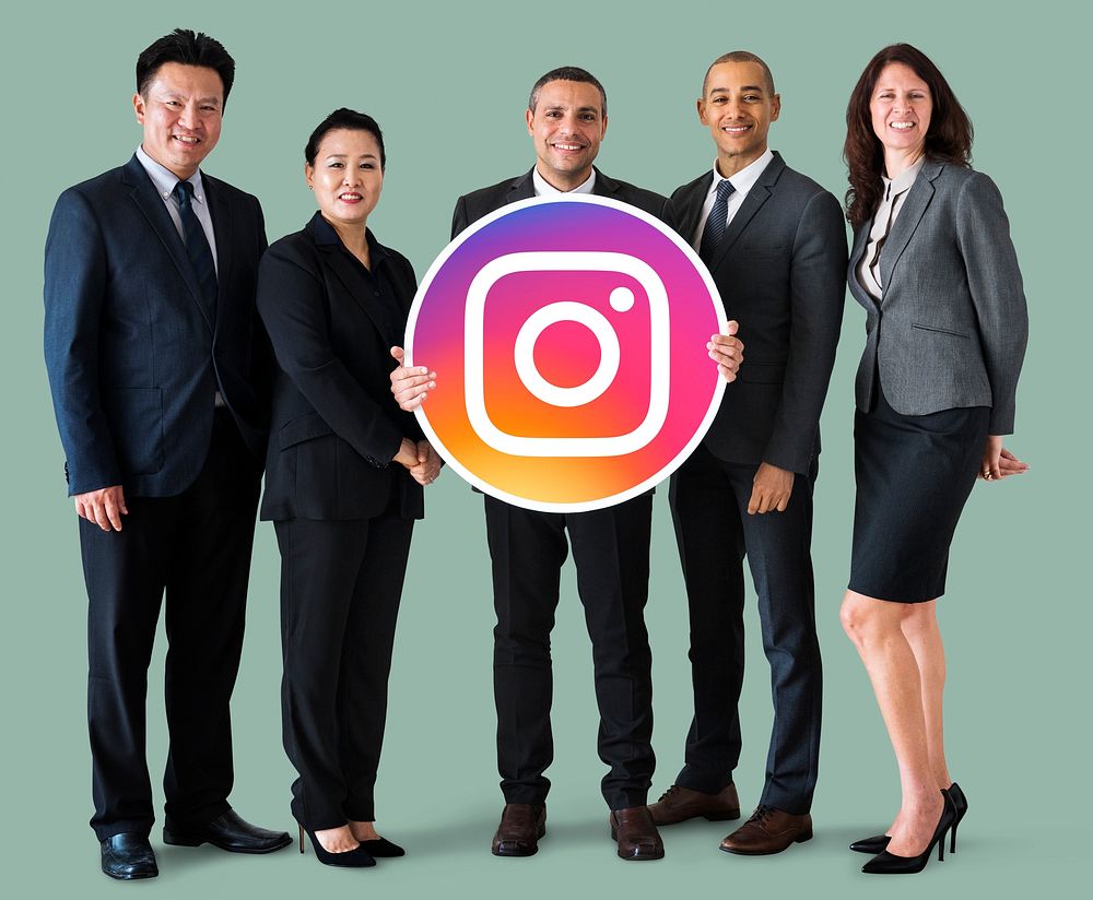 Business people showing an Instagram icon