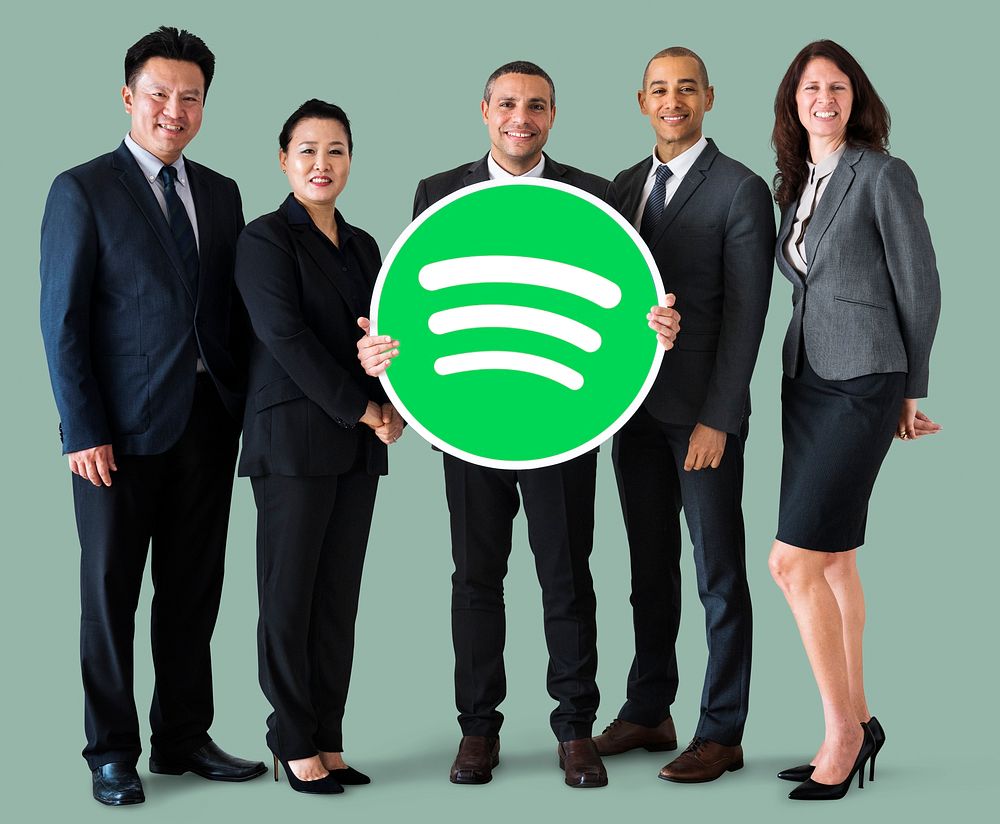 Business people holding a Spotify icon