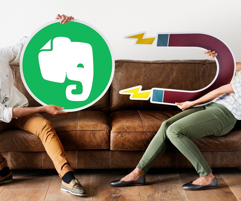 People holding an Evernote icon