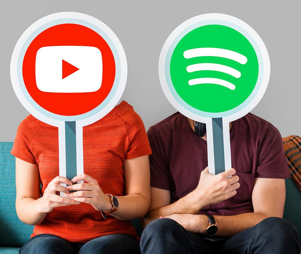 People holding social media icons