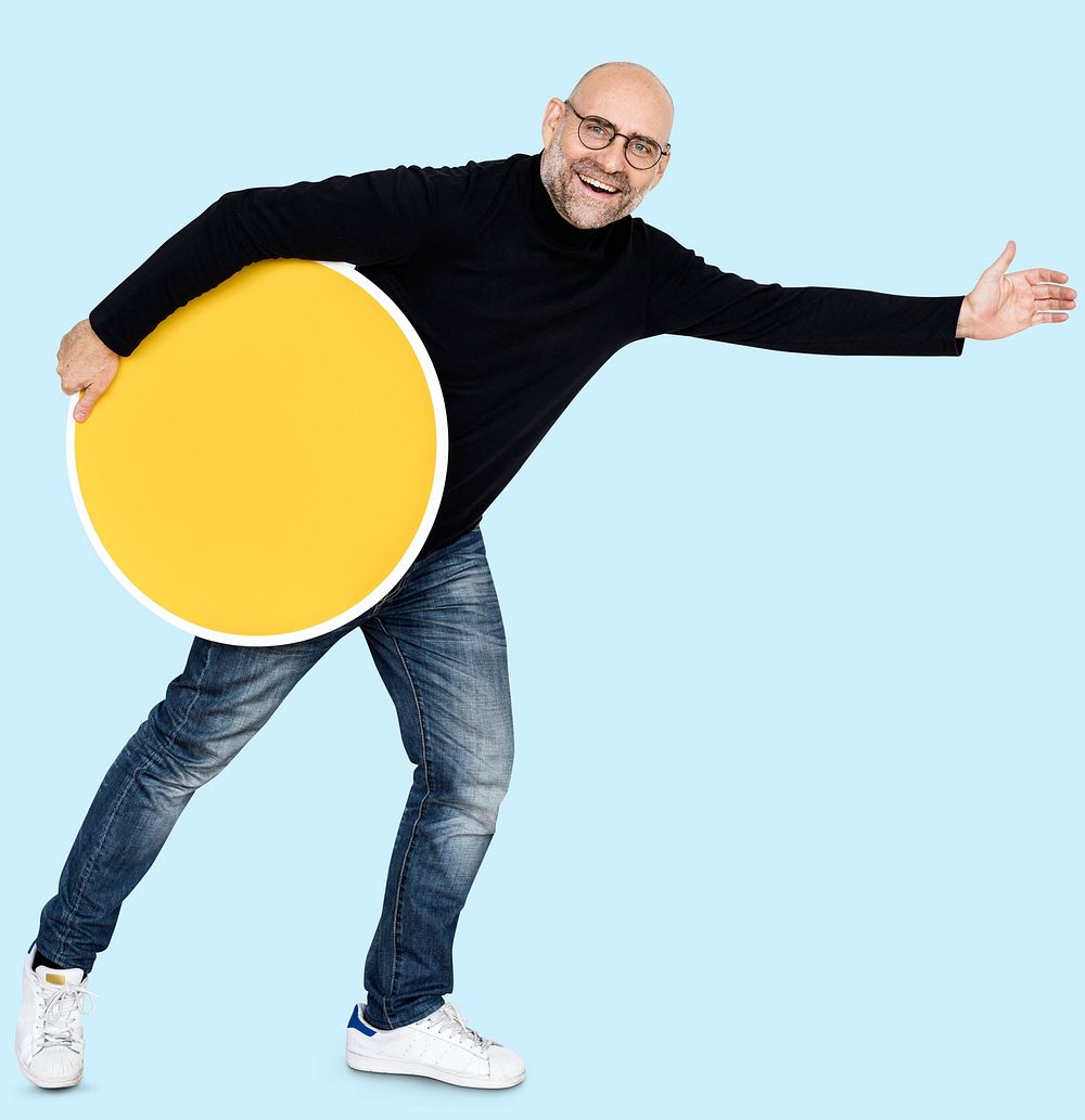 Happy businessman holding an empty round board