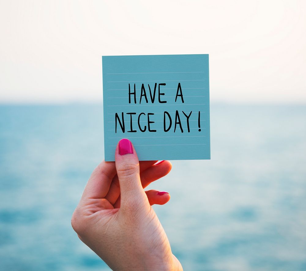 Phrase Have a nice day on a memo paper