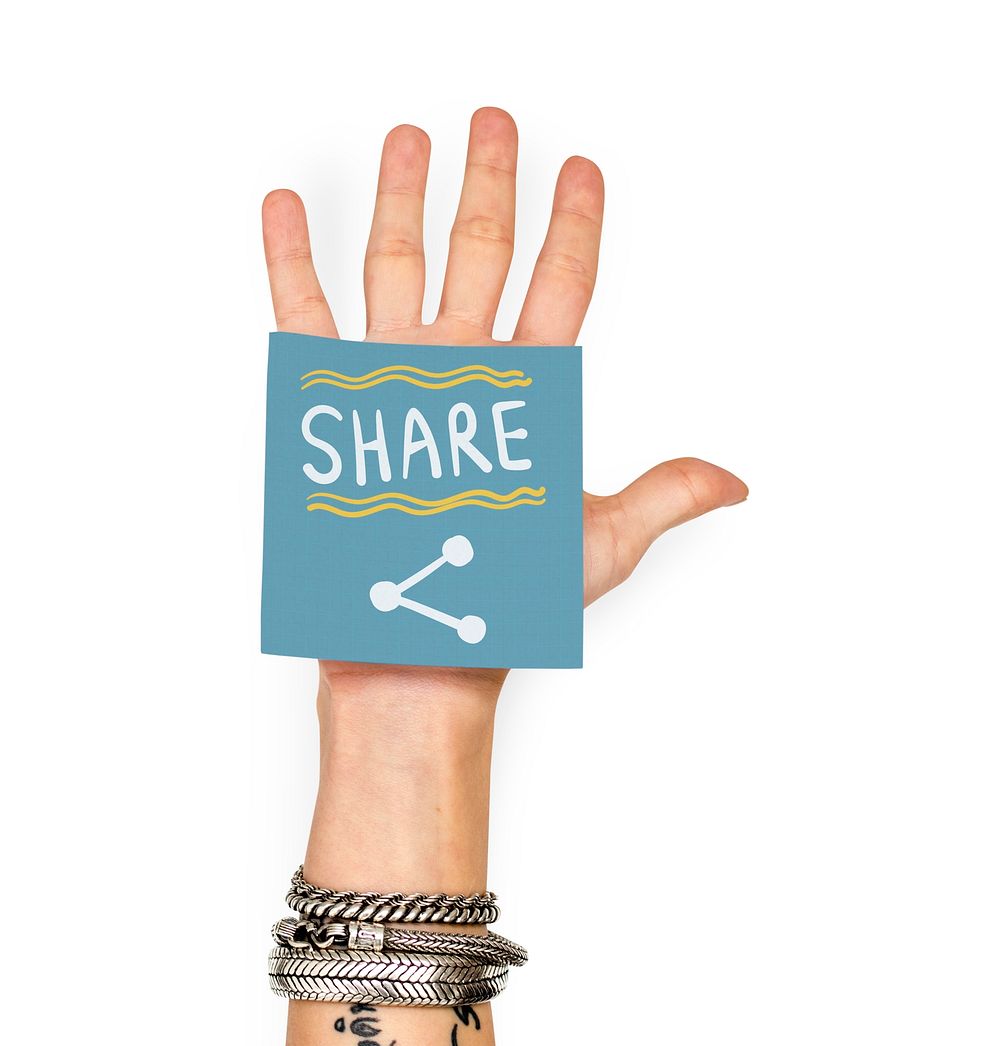 Hand showing a sticky note with Share