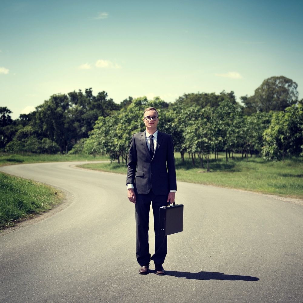 Businessman Standing Green Grass Thinking Concept