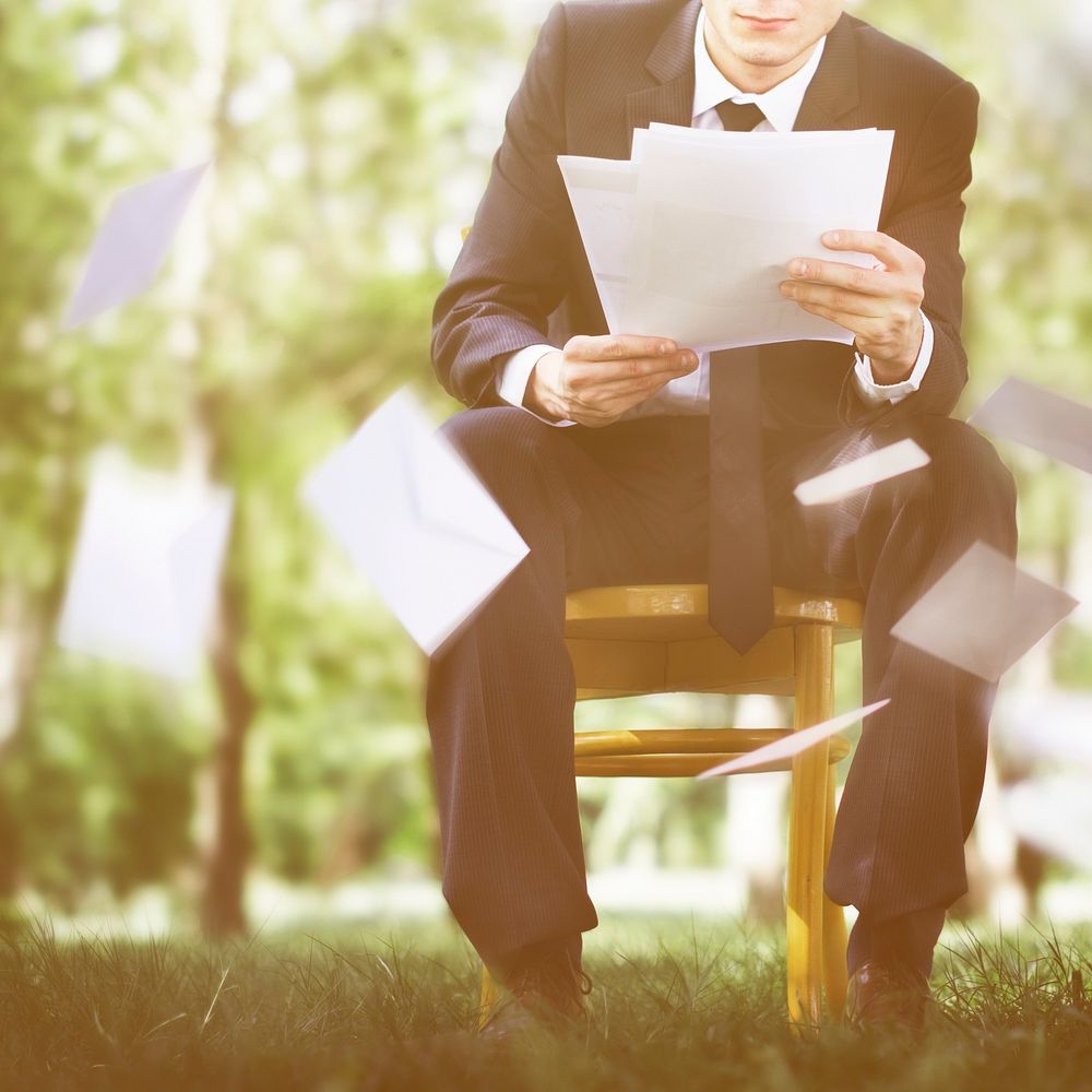 Business Man Sitting Nature Document Concept