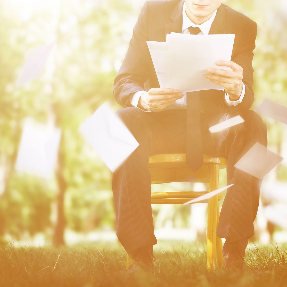 Business Man Sitting Nature Document Concept