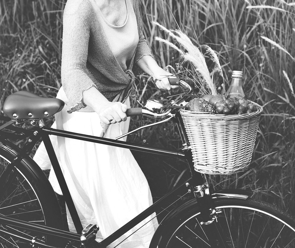 Senior Woman Bicycling Windy Park Concept