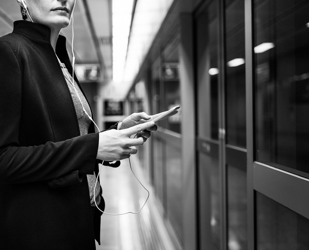 Woman Waiting Subway Terminal Transportation Concept