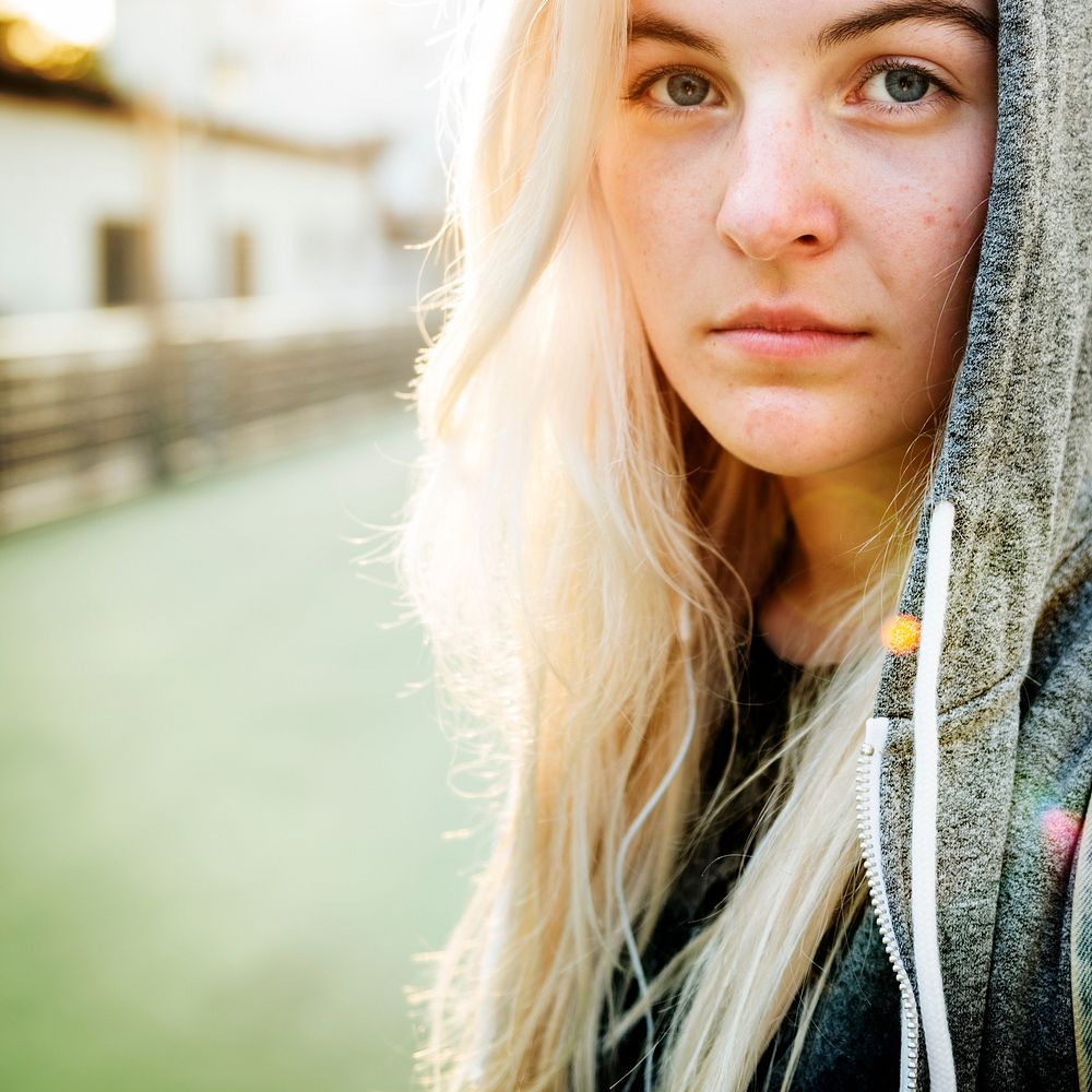 Closeup portrait of caucasian woman with hoodie