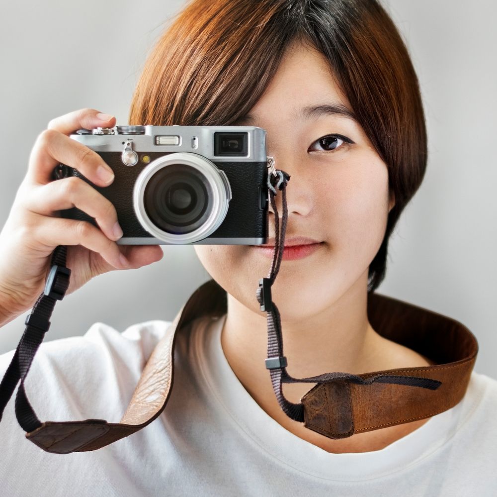 Asian Girl Takin Pictures By Camera Concept