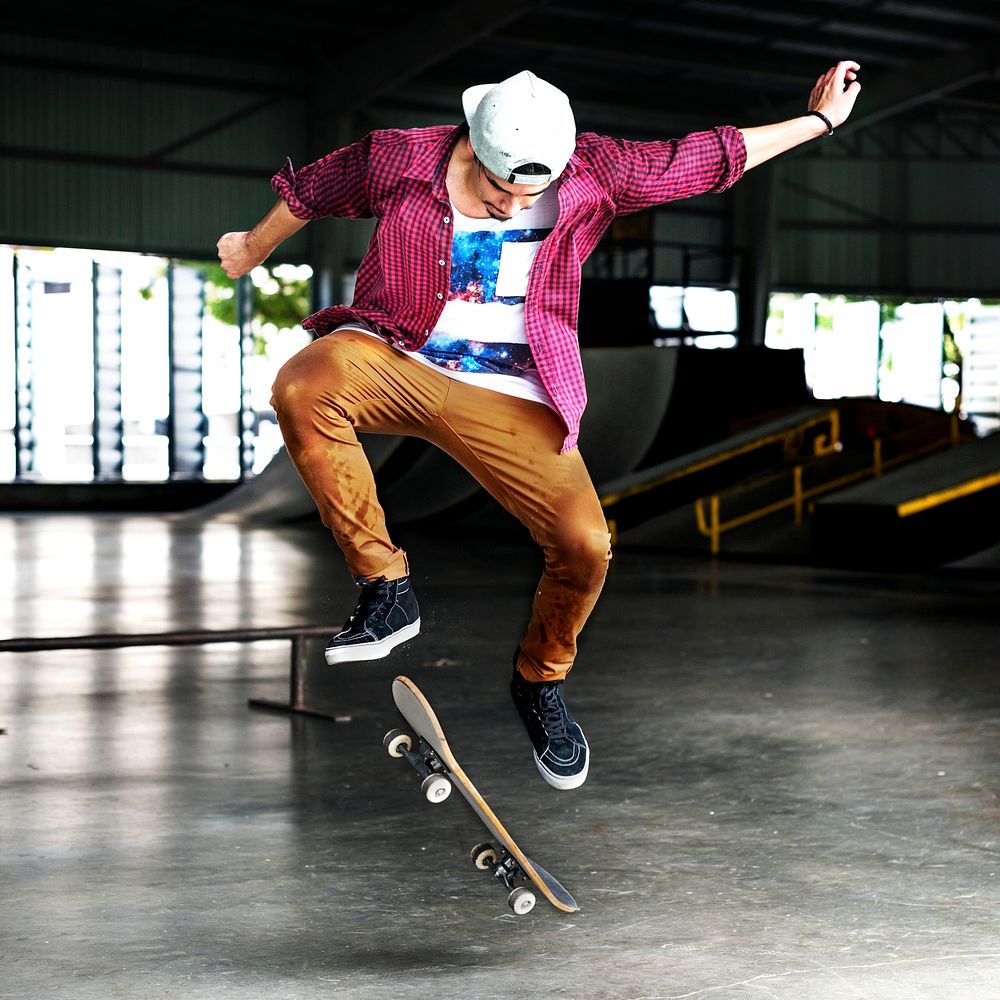 Boy Skateboarding Jump Lifestyle Hipster Concept