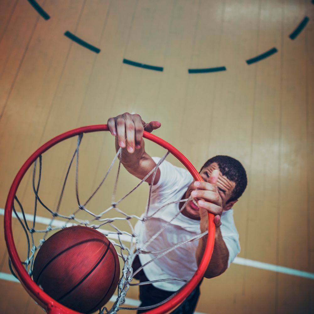 Basketball player making a slam dunk 