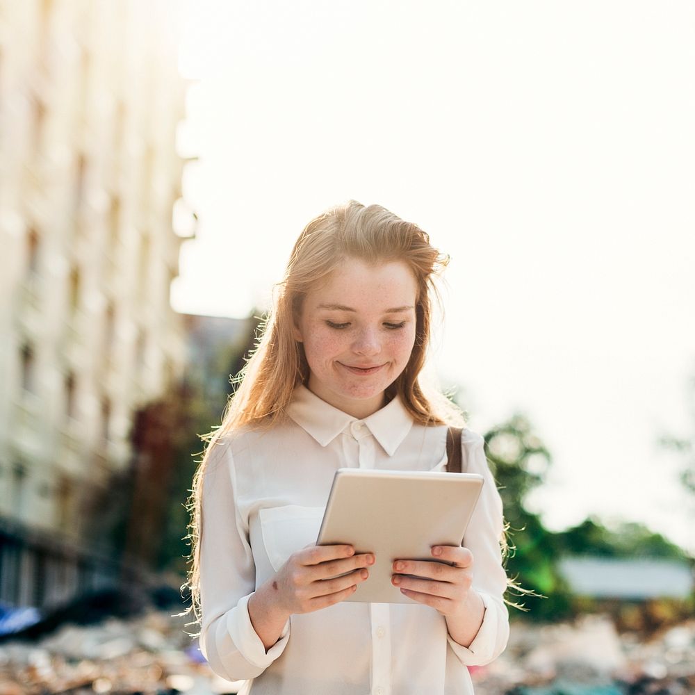 Girl Using Digital Device Concept