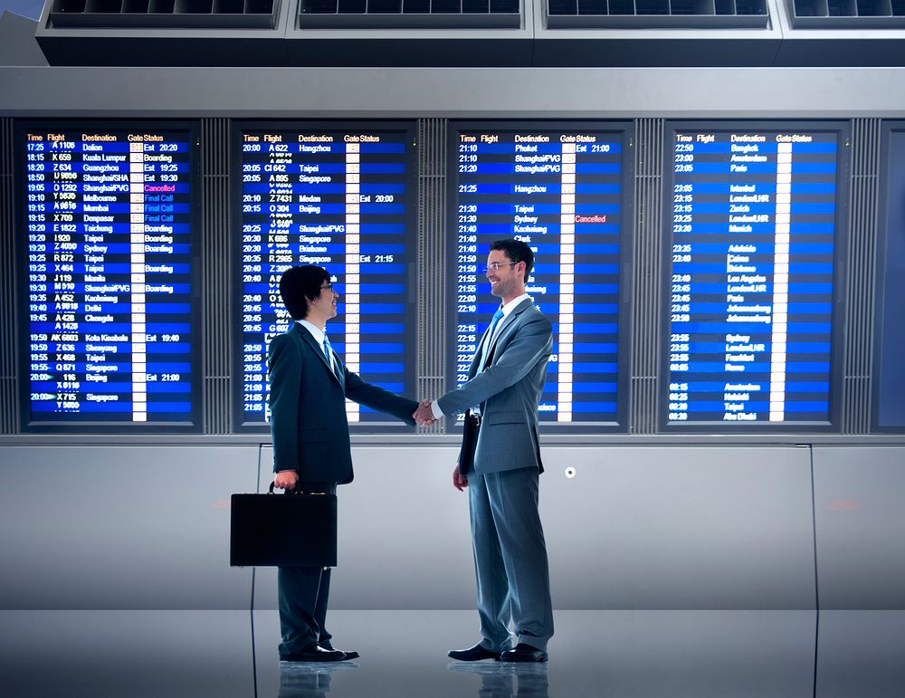 Businessmen Airport Business Commitment Deal Concept