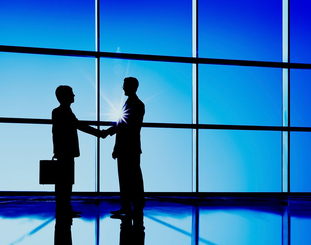 Businessmen Handshaking Contract Deal Business Concept
