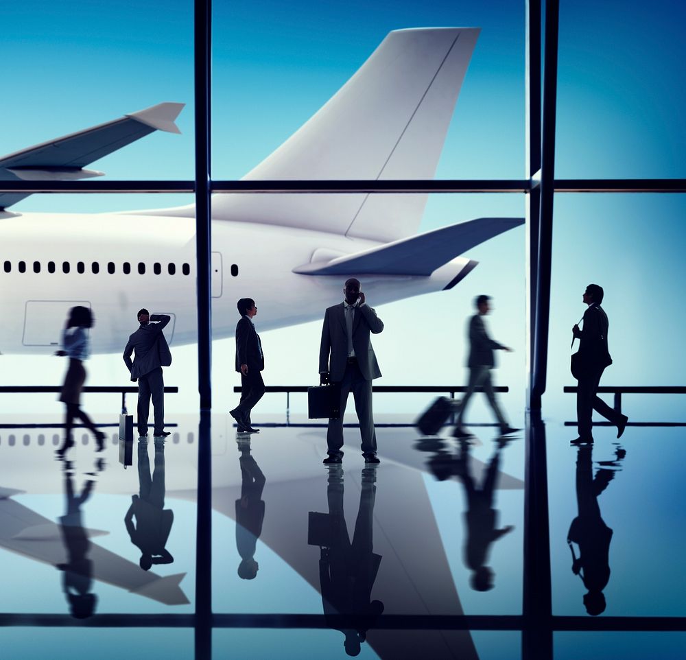 Silhouette Group of Business People with Airplane Concept
