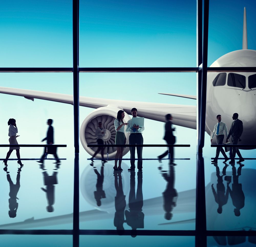 Silhouette Group of Business People with Airplane Concept