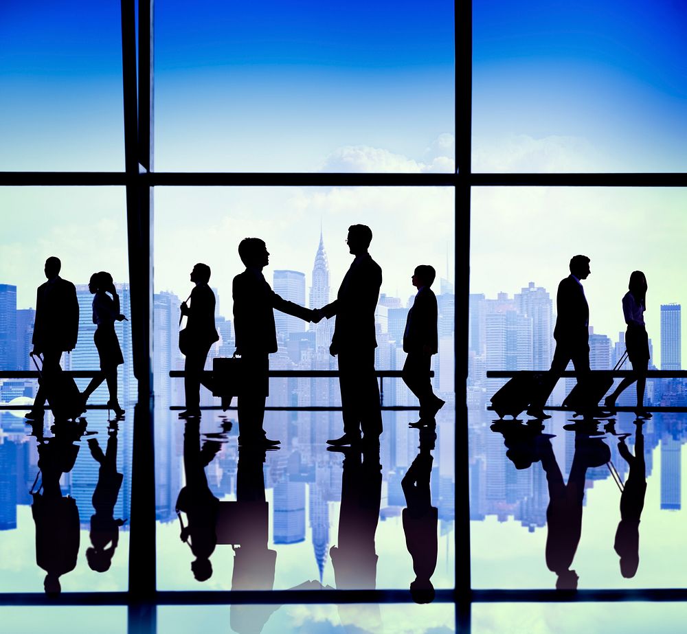 Silhouette Group of Business People Handshake Concept