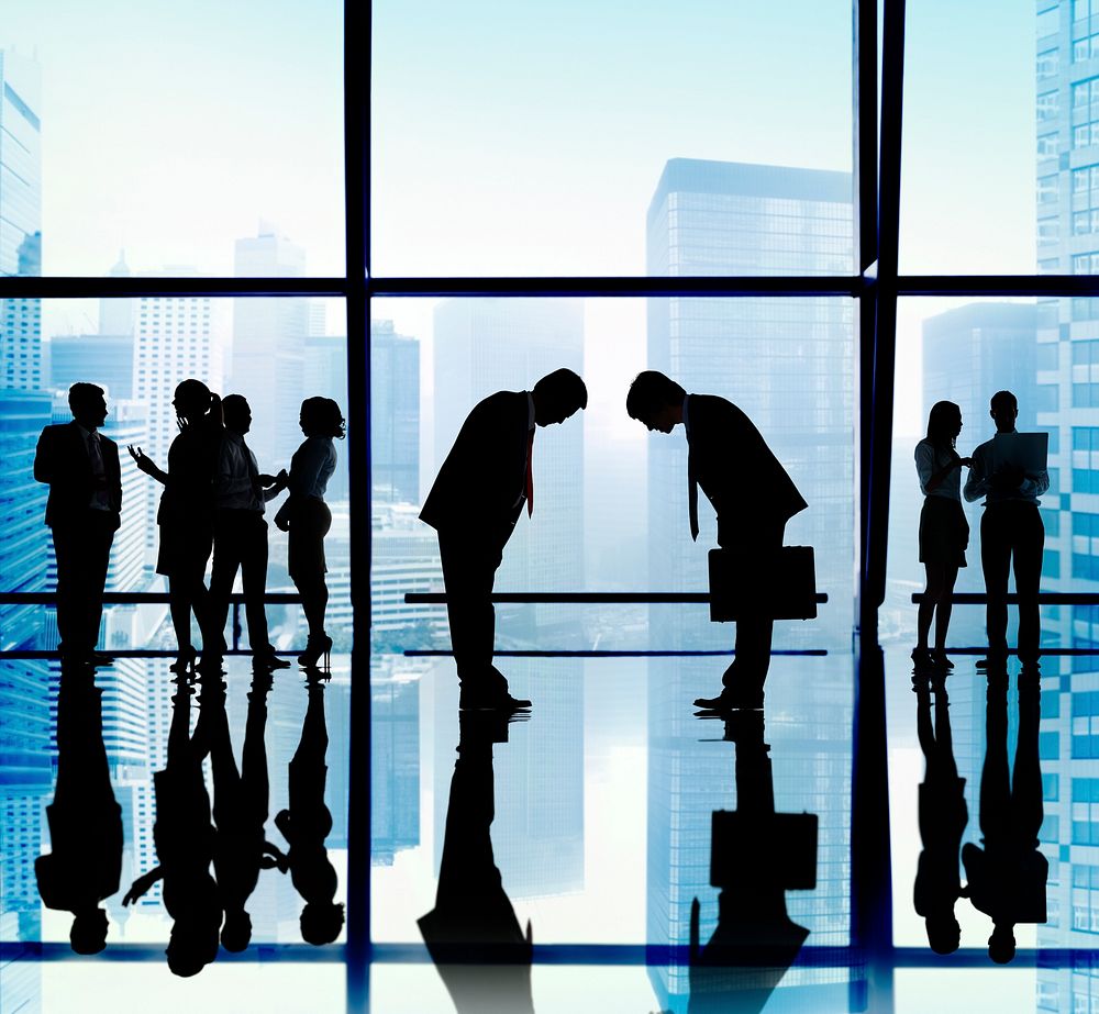 Japanese Business People Bowing Down Office Concept