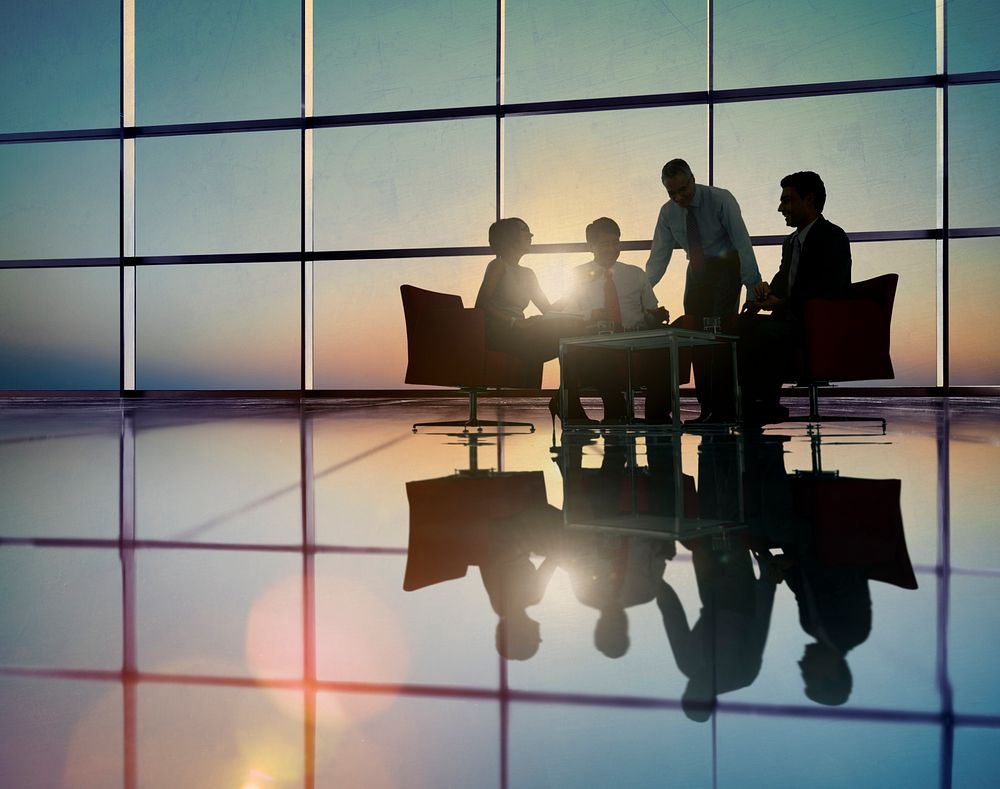 Group of Business People Meeting in Back Lit Concept