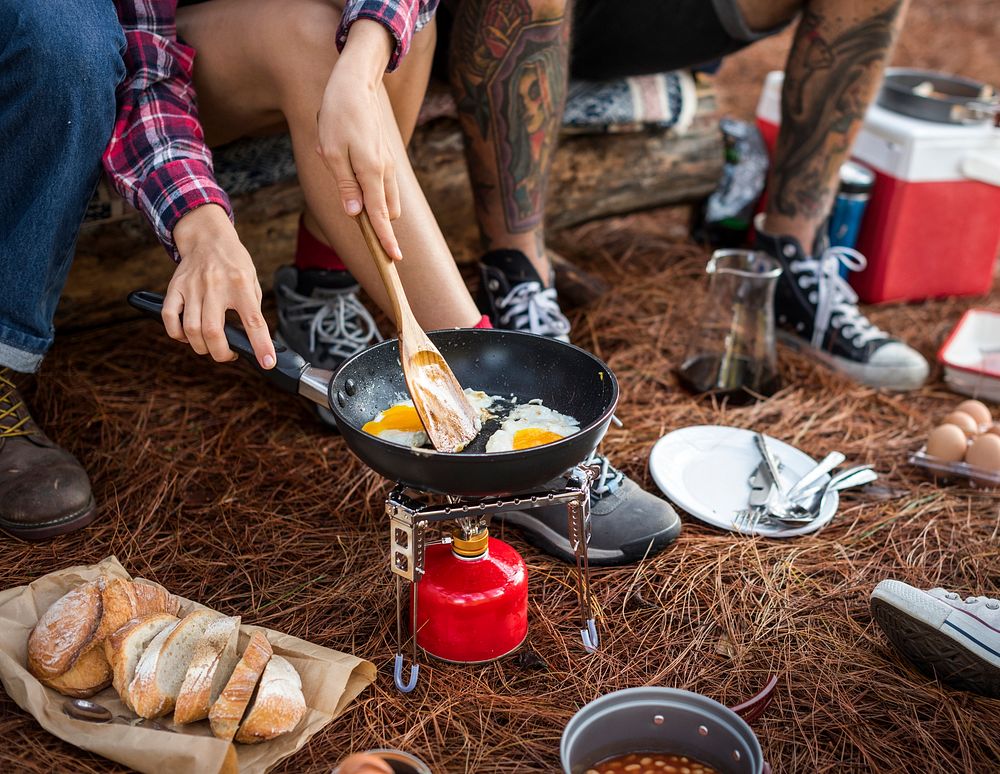 Campers making breakfast at the campsite