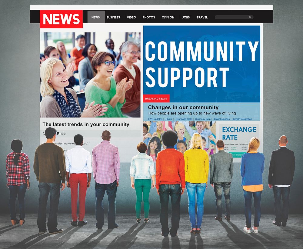 People looking at a community support news page on the wall