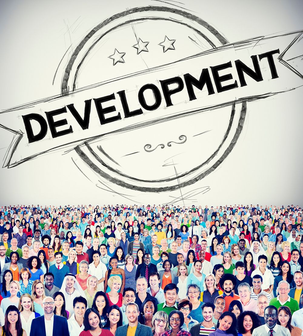 Development badge overlay on a huge crowd of people