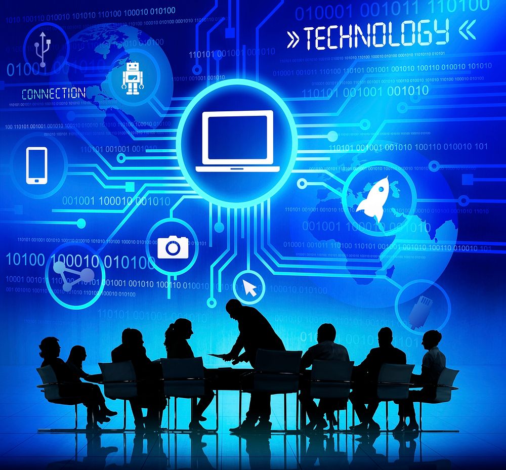 Business People in a Meeting with Technology Concepts