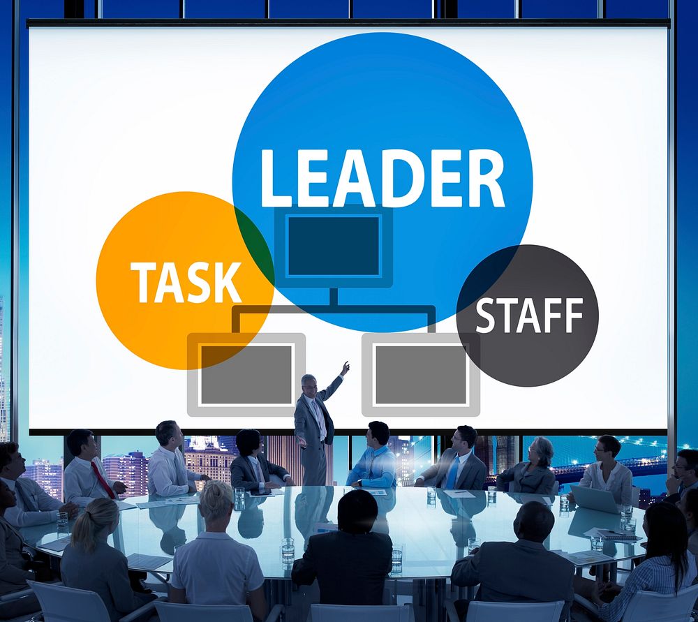 Leadership diagram with silhouette of business people at a meeting table