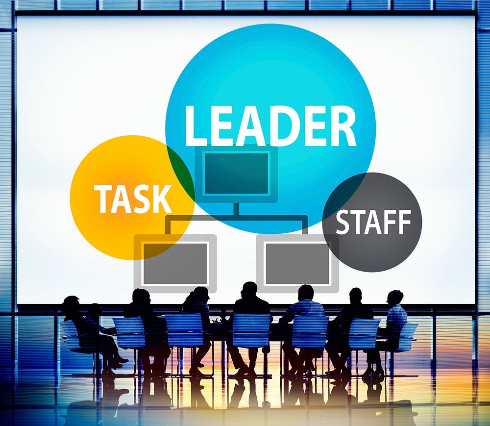 Leadership diagram with silhouette of business people at a meeting table