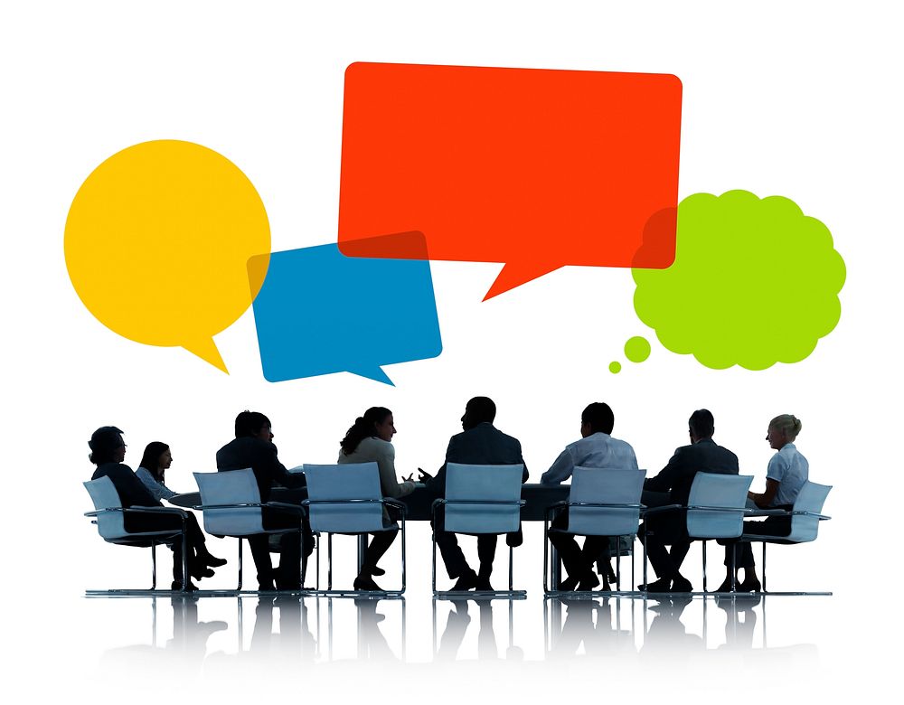Business people in a meeting with speech bubbles