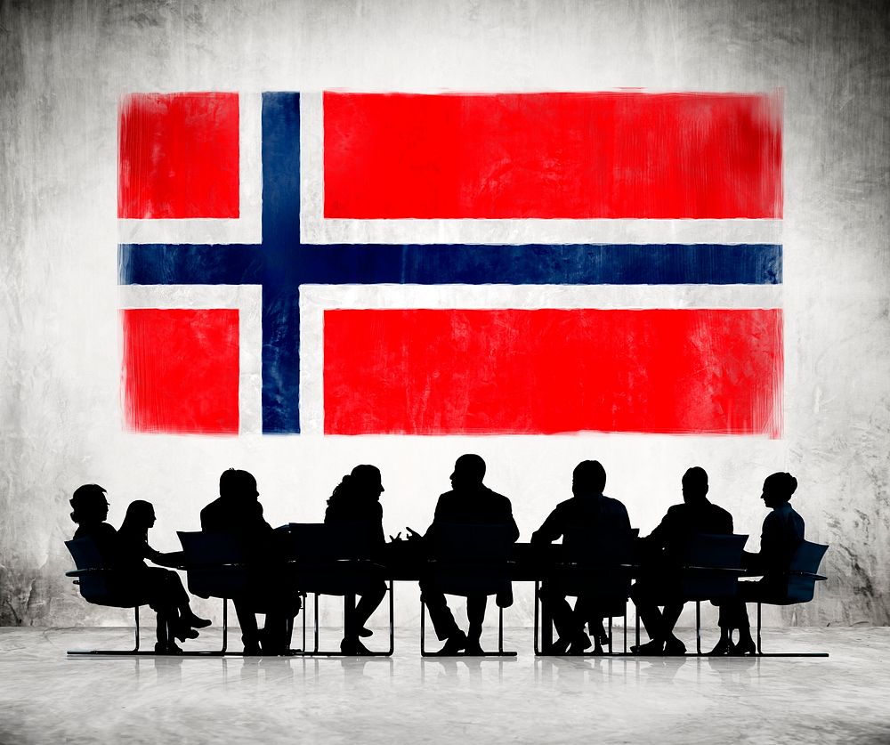 Business People in a Meeting with Norwegian Flag