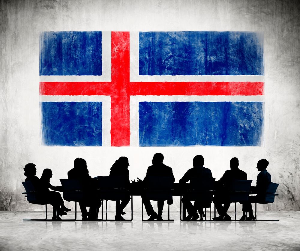 Business People in a Meeting with Icelandic Flag