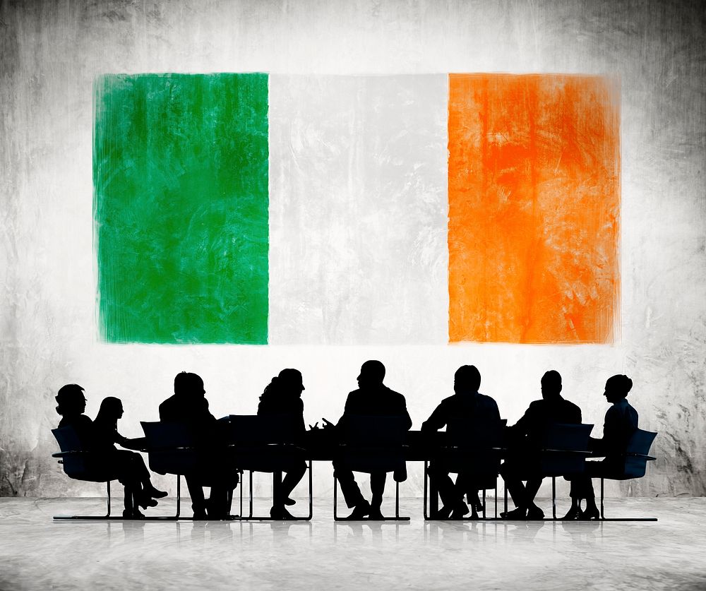 Business People in a Meeting with Irish Flag