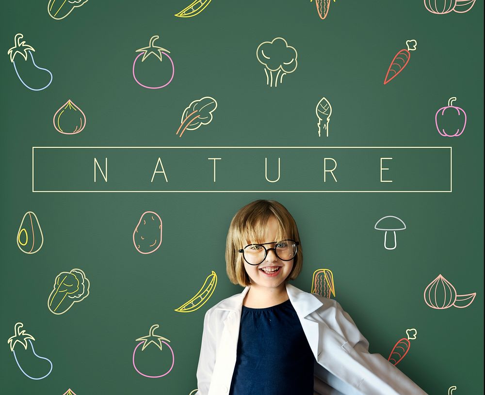 Little girl with a vegetables icon on the board