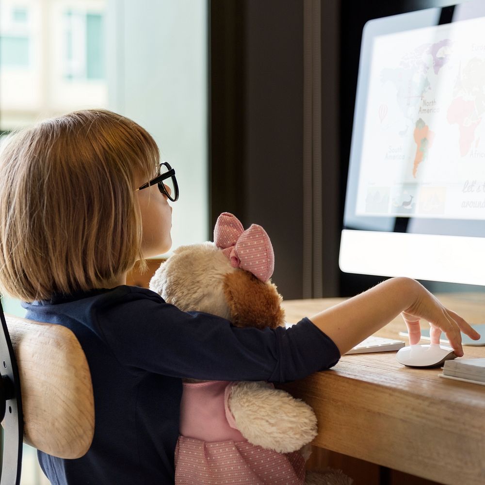 Little Girl Using Computer Concept